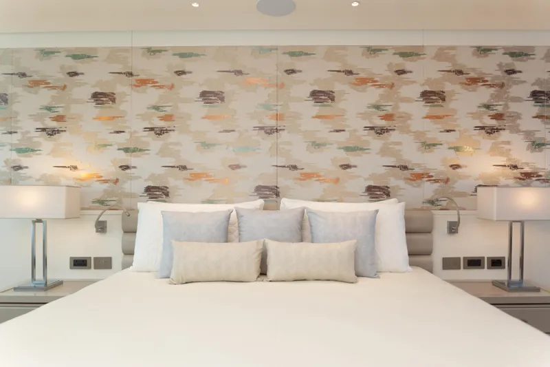 Miss Candy Yacht Photos Pics Luxurious Versilcraft HS 2022 yacht bedroom with elegant decor and modern lighting.