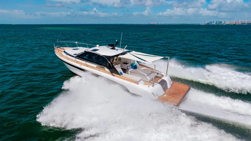 Mojo Yacht Photos Pics 2022 Anka 45 Coupe Cruiser speeding on open water.