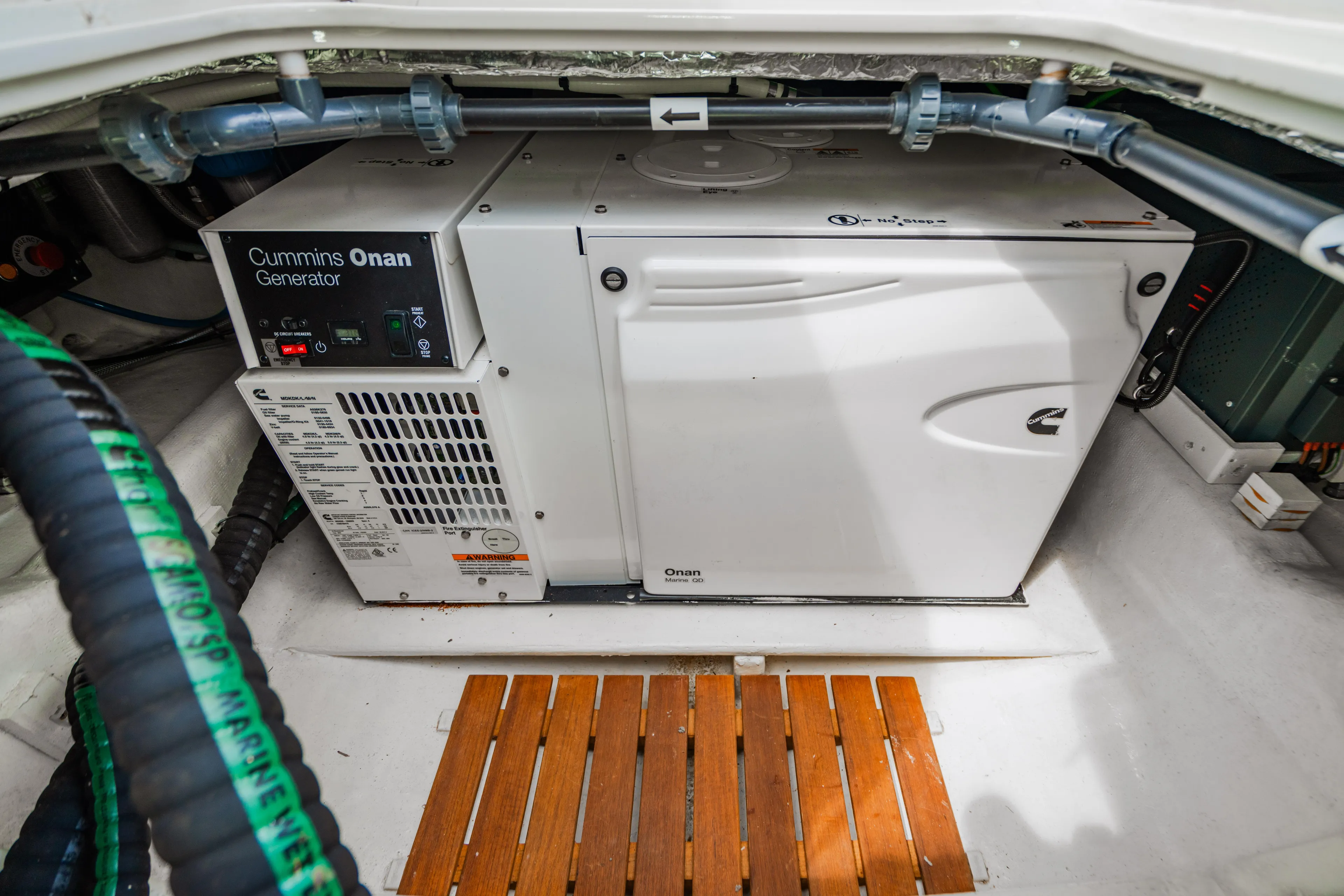 Mojo Yacht Photos Pics Cummins Onan generator in the engine room of a 2022 Anka 45 Coupe Cruiser.