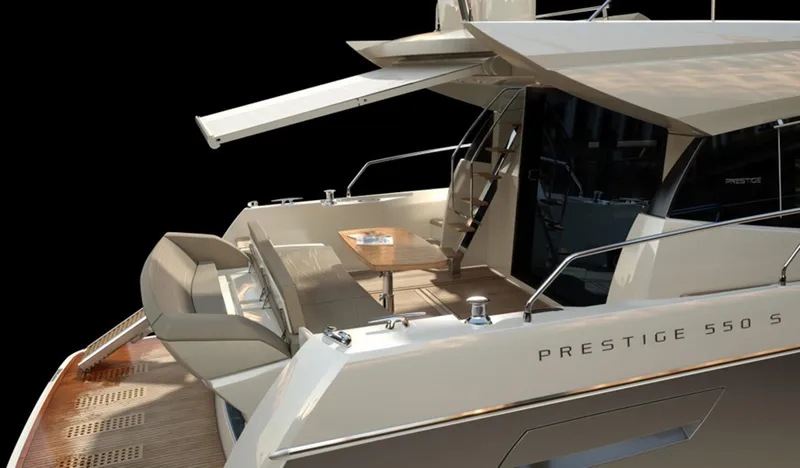  Yacht Photos Pics Manufacturer Provided Image: 2013 Prestige 550 S yacht with elegant outdoor seating and dining area.
