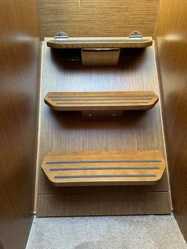 This Could Be Yours Yacht Photos Pics Wooden interior steps in a 2023 Bavaria R40 Coupe yacht.