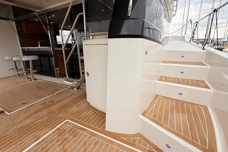  Yacht Photos Pics Luxurious 2025 Aquila 50 Yacht with elegant deck and modern interior design.