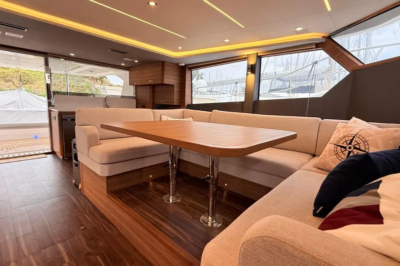  Yacht Photos Pics Luxurious interior of 2025 Aquila 50 Yacht with elegant seating and modern design.