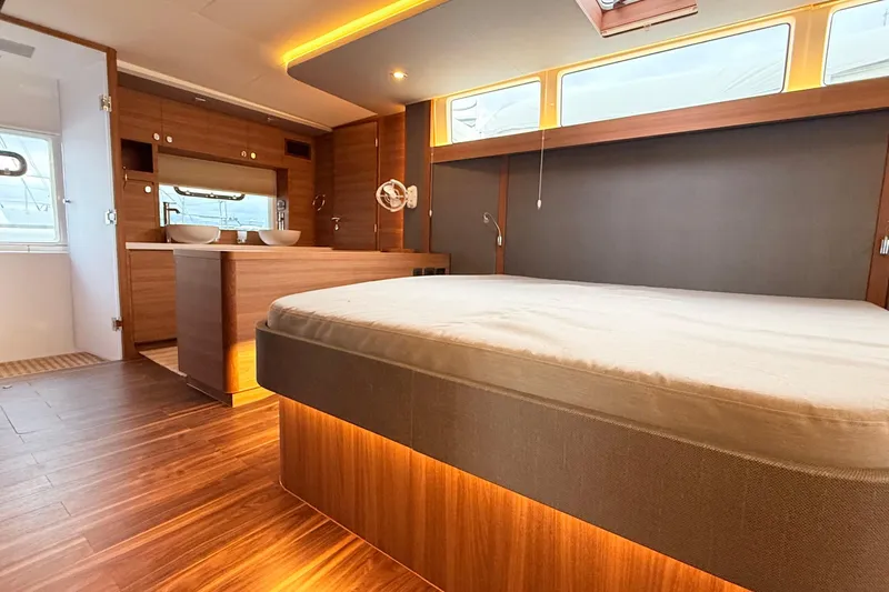  Yacht Photos Pics Luxurious interior of 2025 Aquila 50 Yacht with modern wood finishes and spacious layout.