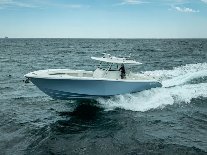  Yacht Photos Pics 2018 Yellowfin 39 Offshore boat cruising on open sea.