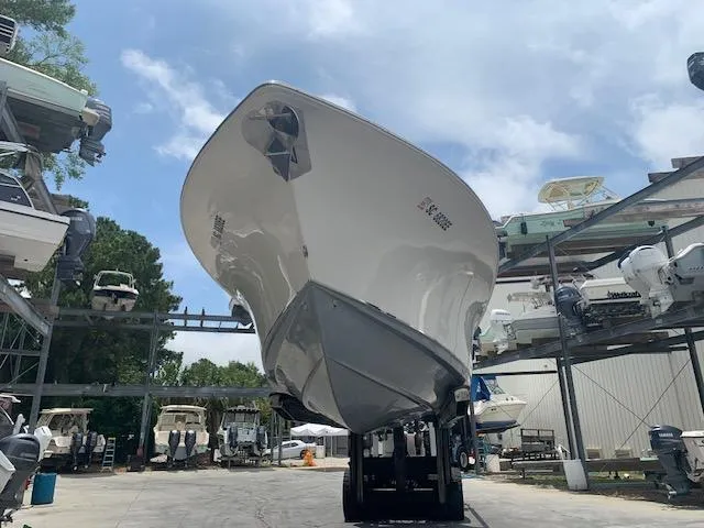  Yacht Photos Pics 2014 Sea Hunt Gamefish 30 boat in storage facility, viewed from below.