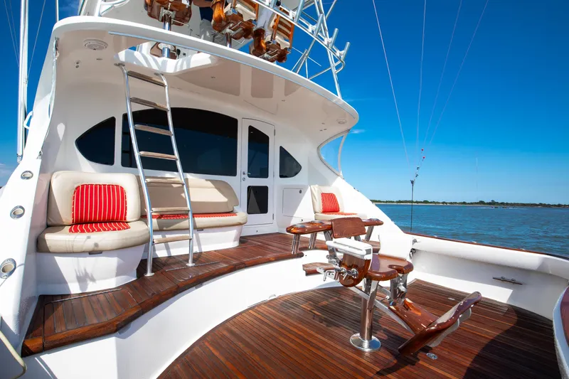 Love Boat Yacht Photos Pics Luxurious 2015 Ocean Yachts 64 Convertible deck with seating and fishing chair.