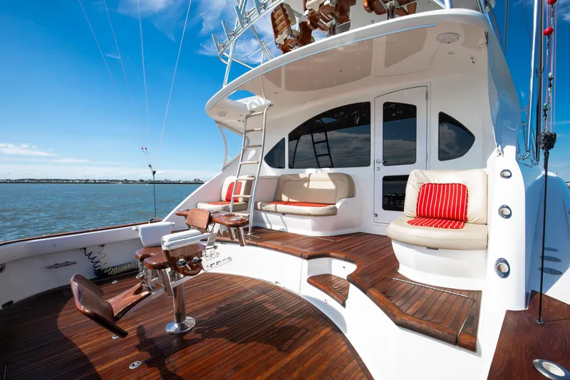 Love Boat Yacht Photos Pics Luxurious 2015 Ocean Yachts 64 Convertible with elegant deck seating and fishing chair.