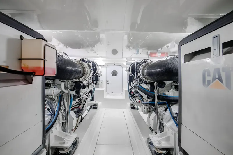 Love Boat Yacht Photos Pics Engine room of 2015 Ocean Yachts 64 Convertible, featuring CAT machinery.