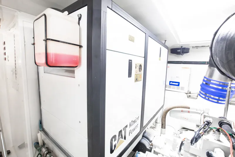 Love Boat Yacht Photos Pics Engine room of 2015 Ocean Yachts 64 Convertible with CAT Marine Power system.