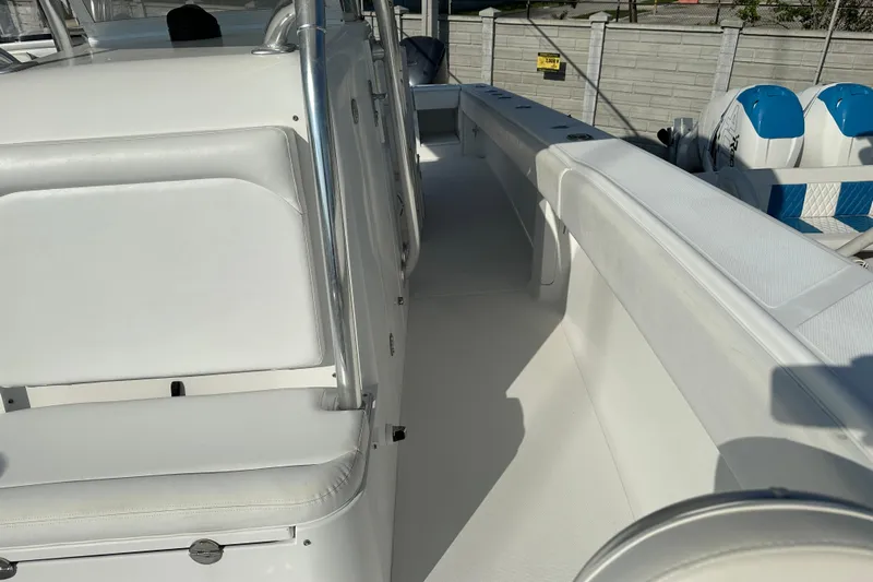  Yacht Photos Pics 2013 Bahama 37CC boat interior with white seating and sleek design.