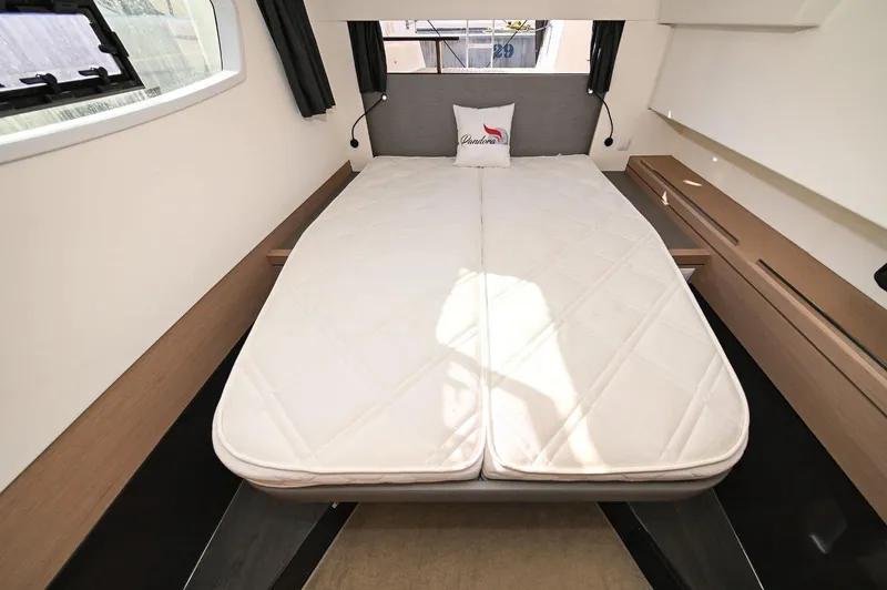 Pandora Yacht Photos Pics Interior cabin of 2019 Fountaine Pajot Saona 47 catamaran with double bed and modern design.