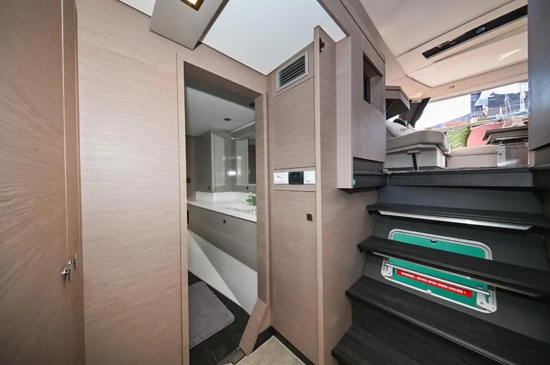 Pandora Yacht Photos Pics Interior of 2019 Fountaine Pajot Saona 47 yacht, featuring modern design and staircase.