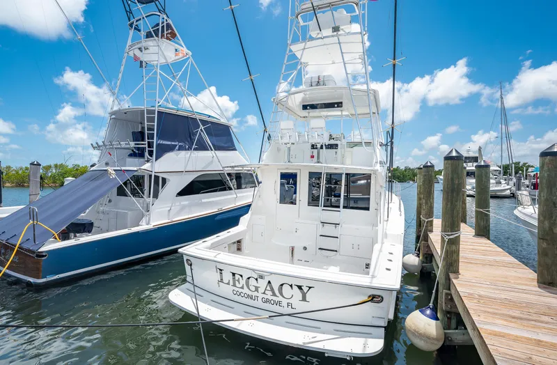 50 Hatteras Convertible Yacht Photos Pics 1992 Hatteras 50 Convertible yacht docked at a marina.