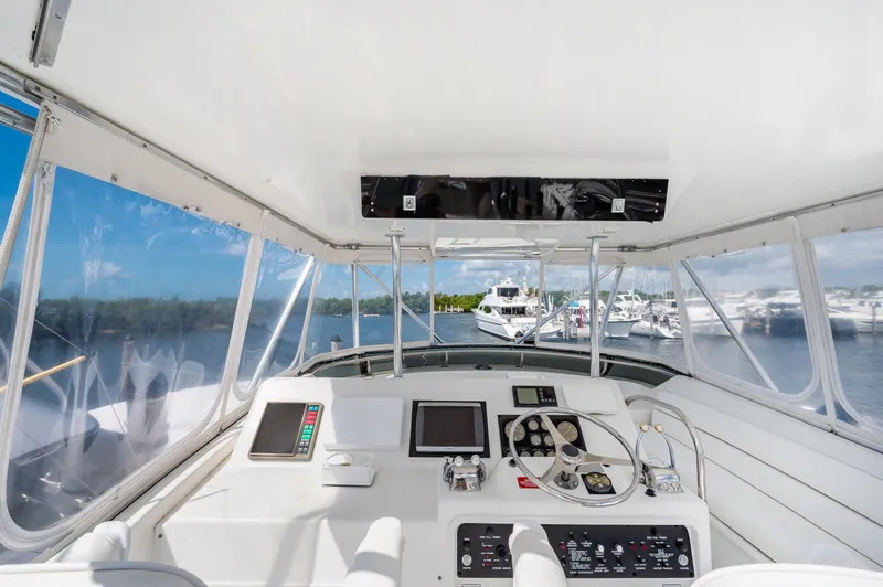 50 Hatteras Convertible Yacht Photos Pics Interior helm of 1992 Hatteras 50 Convertible yacht with navigation equipment.