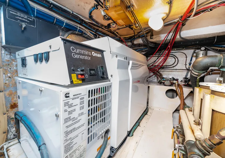 50 Hatteras Convertible Yacht Photos Pics Engine room of a 1992 Hatteras 50 Convertible with Cummins Onan generator.