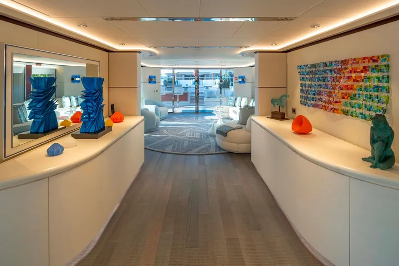 Book Ends Yacht Photos Pics Luxurious interior of 2022 Heesen 5000 yacht with modern art and elegant decor.