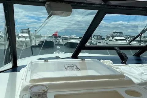 "moxie" Yacht Photos Pics 1998 Tiara Yachts 35 Open Hardtop at marina, view from cockpit.