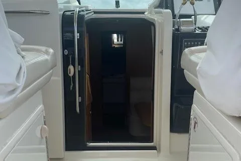 "moxie" Yacht Photos Pics 1998 Tiara Yachts 35 Open Hardtop interior cabin entrance with seating.