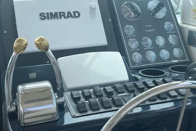 "moxie" Yacht Photos Pics Control panel of a 1998 Tiara Yachts 35 Open Hardtop with Simrad navigation system.