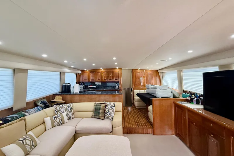 Kickback Yacht Photos Pics Luxurious interior of a 2004 Viking 65 Convertible yacht with elegant furnishings.