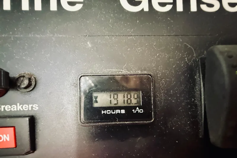 Kickback Yacht Photos Pics Hour meter showing 1918.9 hours on 2004 Viking 65 Convertible.