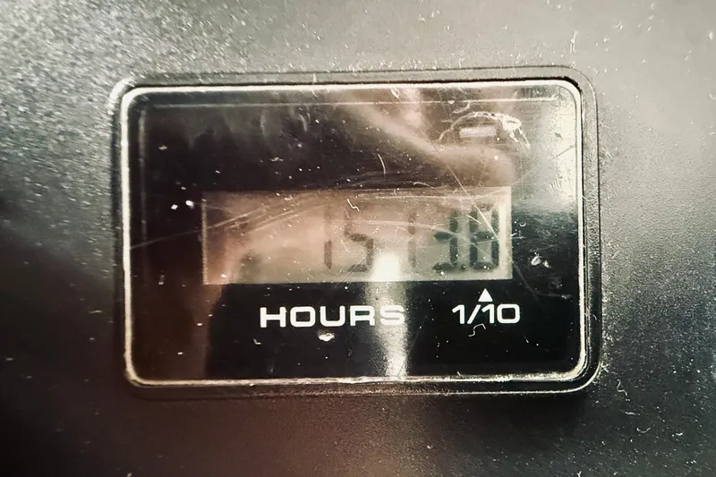 Kickback Yacht Photos Pics Hour meter display on 2004 Viking 65 Convertible boat, showing 1573.0 hours.