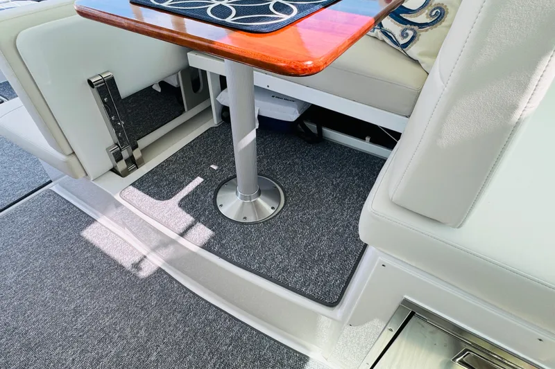  Yacht Photos Pics Interior of 2025 Back Cove 34O boat with elegant seating and table design.