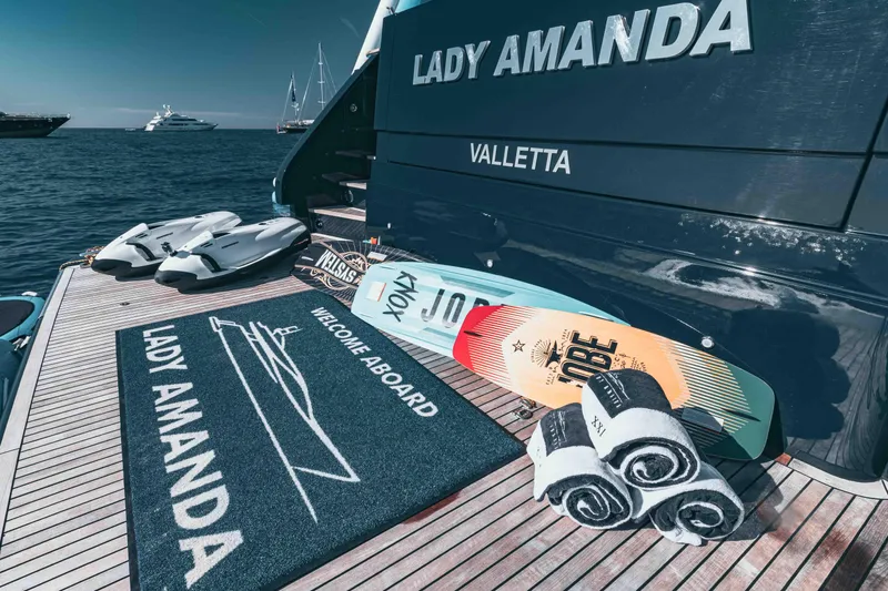 Lady Amanda Yacht Photos Pics Couach 2800 yacht "Lady Amanda" deck with wakeboards and towels, 2006 model.