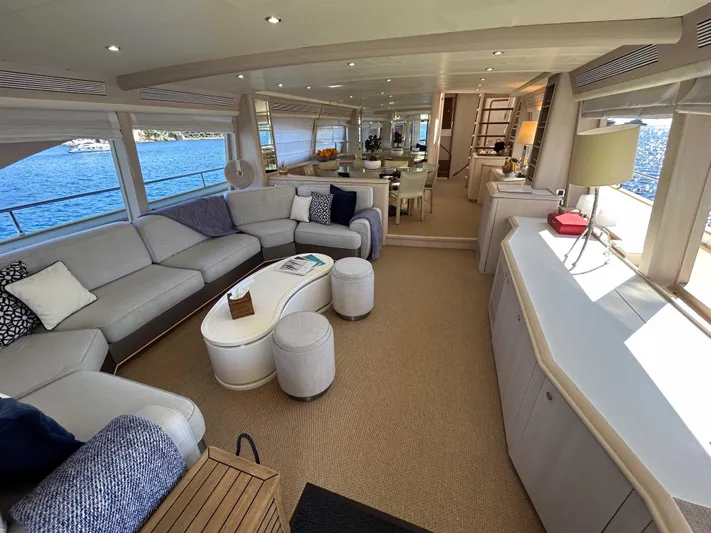 Lady Amanda Yacht Photos Pics Luxurious interior of 2006 Couach 2800 yacht with elegant seating and ocean view.