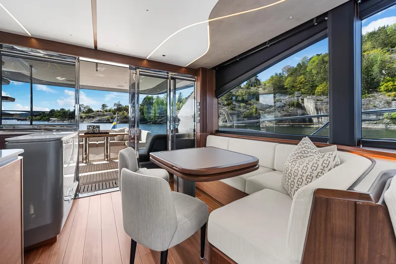 S72515 Yacht Photos Pics Luxurious interior of 2023 Princess S72 yacht with elegant seating and scenic views.