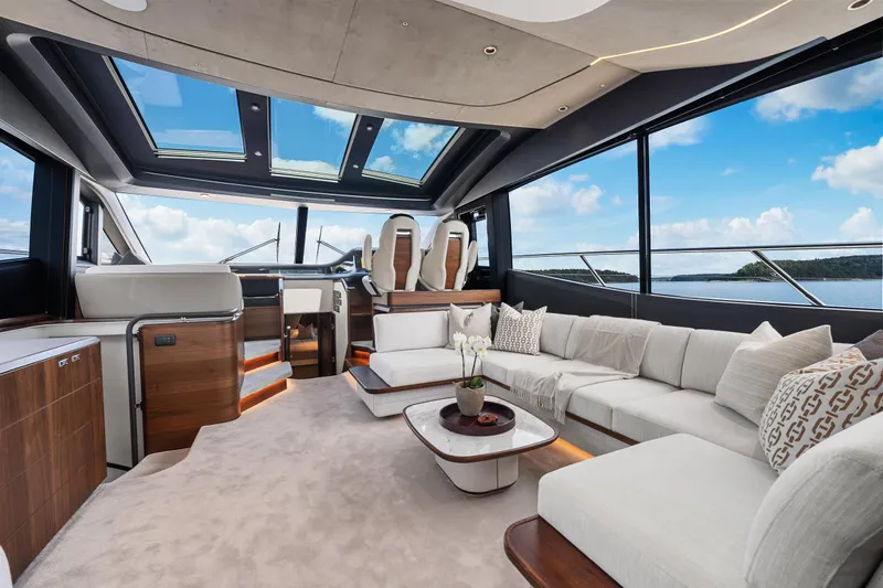 S72515 Yacht Photos Pics Luxurious interior of 2023 Princess S72 yacht with elegant seating and panoramic windows.