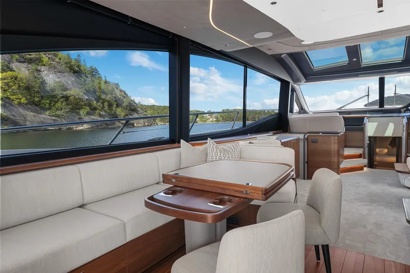 S72515 Yacht Photos Pics Luxurious interior of 2023 Princess S72 yacht with elegant seating and scenic views.