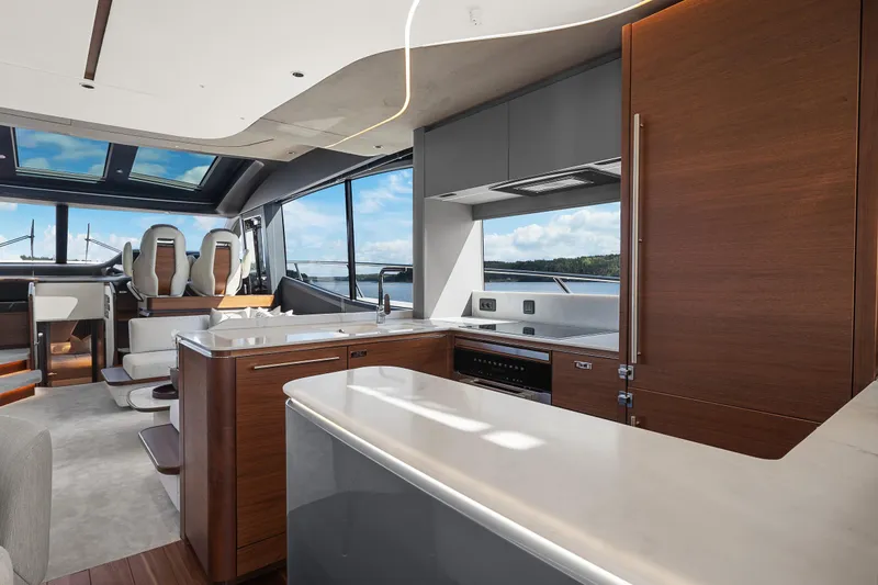 S72515 Yacht Photos Pics Luxurious interior of 2023 Princess S72 yacht with modern kitchen and panoramic windows.