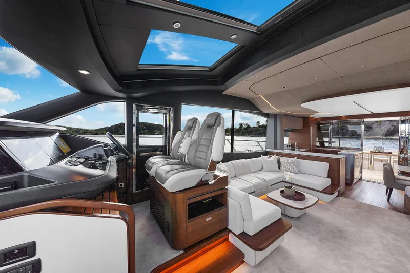 S72515 Yacht Photos Pics Luxurious interior of 2023 Princess S72 yacht with modern seating and panoramic views.