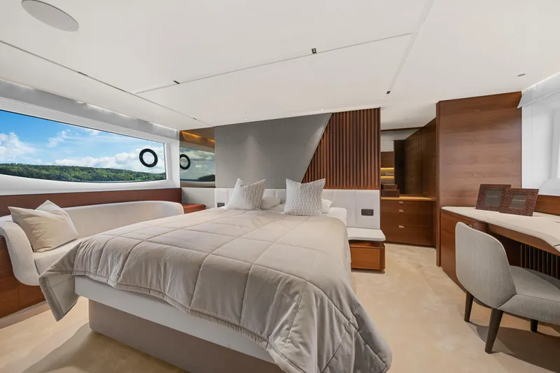 S72515 Yacht Photos Pics Luxurious bedroom interior of 2023 Princess S72 yacht with modern design and scenic window view.