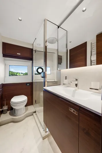 S72515 Yacht Photos Pics Luxurious bathroom in 2023 Princess S72 yacht, featuring modern fixtures and elegant wood accents.