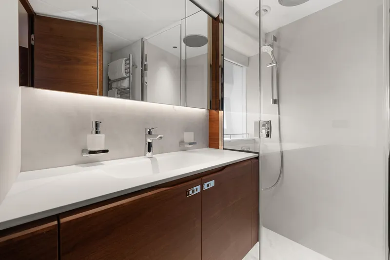 S72515 Yacht Photos Pics Luxurious bathroom in 2023 Princess S72 yacht with modern fixtures and sleek design.