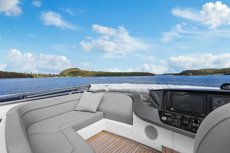 S72515 Yacht Photos Pics Luxury yacht Princess S72, 2023 model, with elegant seating and scenic ocean view.