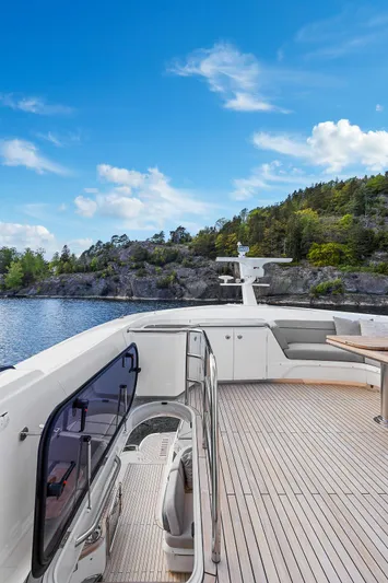 S72515 Yacht Photos Pics Luxury Princess S72 yacht deck with scenic coastal view, 2023 model.