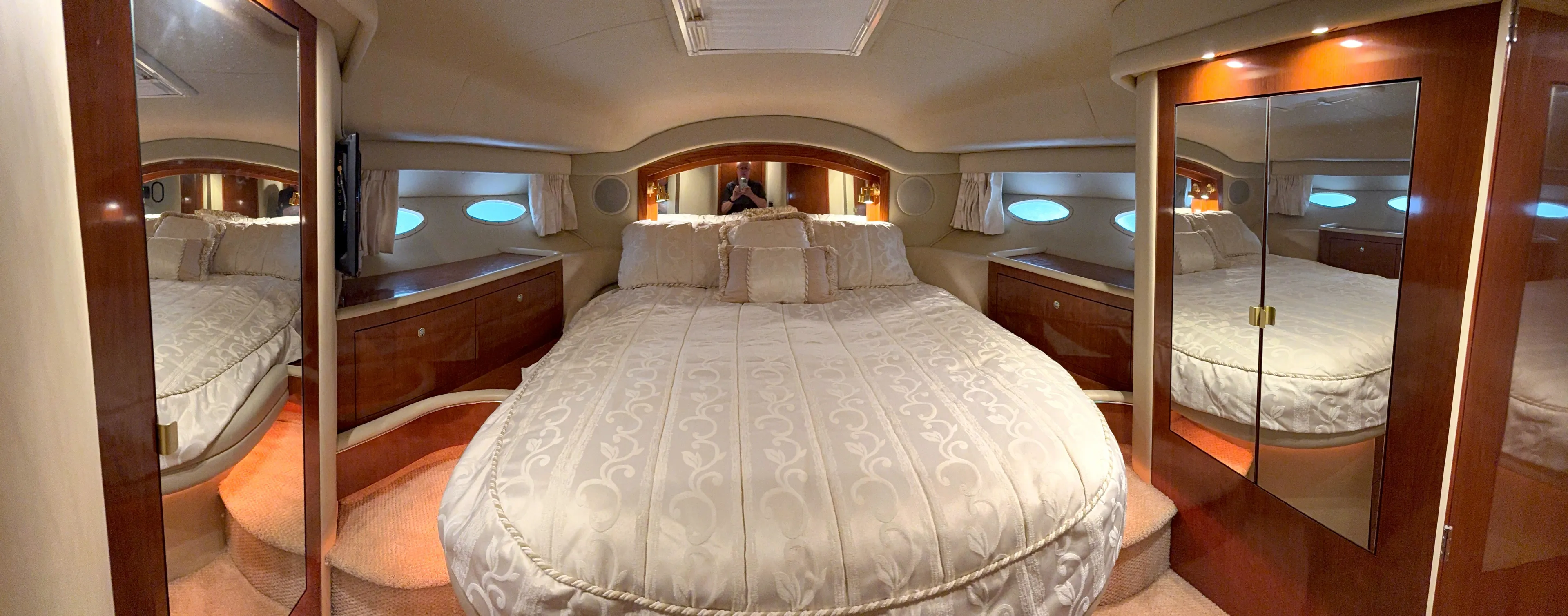 Messing About Yacht Photos Pics Luxurious bedroom interior of 2003 Sea Ray 400 Sedan Bridge yacht.