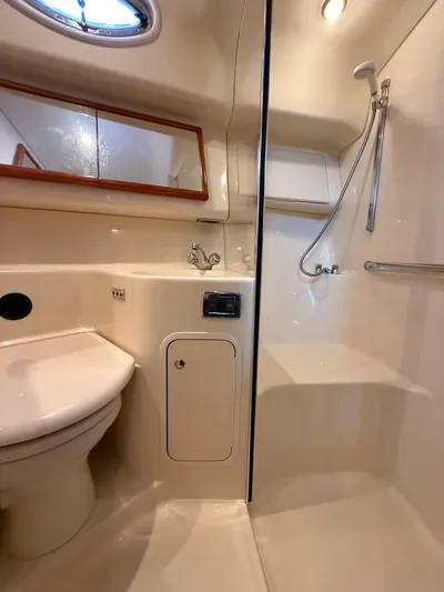 Messing About Yacht Photos Pics Luxurious bathroom in 2003 Sea Ray 400 Sedan Bridge yacht with shower and toilet.