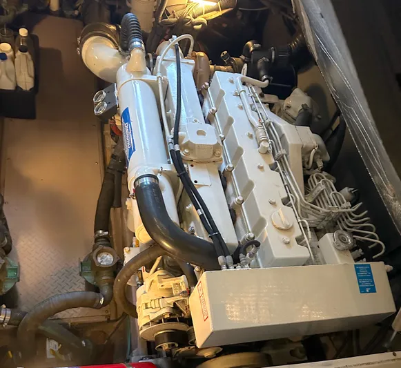 Messing About Yacht Photos Pics Engine compartment of a 2003 Sea Ray 400 Sedan Bridge yacht, showcasing detailed machinery.