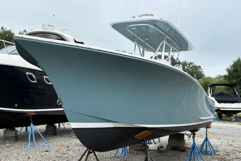  Yacht Photos Pics 2025 Weaver 270 boat on stands, featuring sleek design and Garmin equipment.