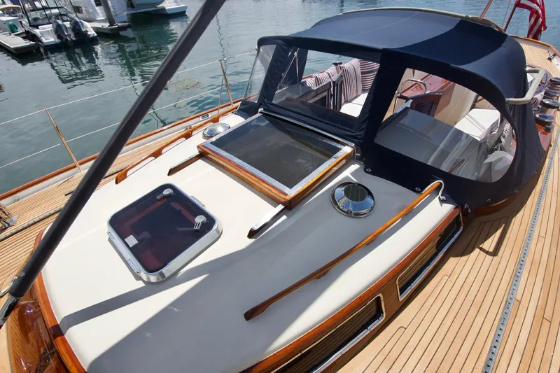 Volunteer Yacht Photos Pics Custom 1996 Bruckmann Yachts deck with sleek design and modern features, docked at marina.