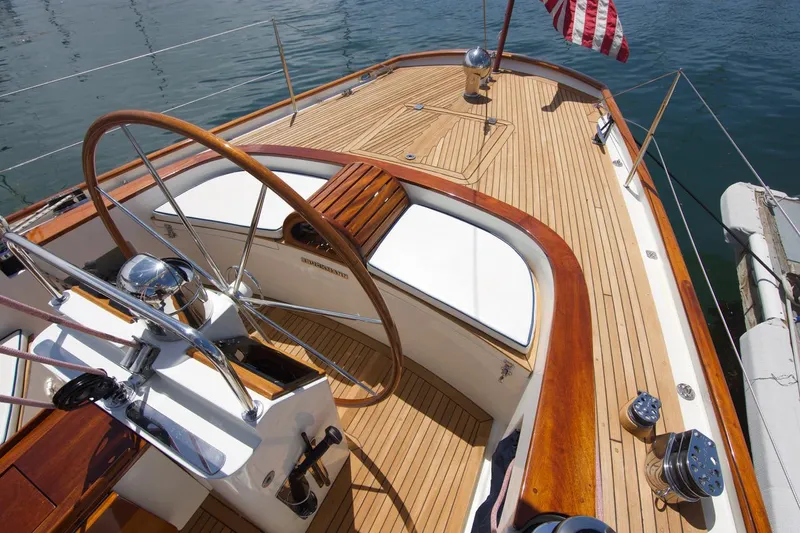 Volunteer Yacht Photos Pics Elegant 1996 Custom Bruckmann Yachts deck with wooden steering wheel and American flag.