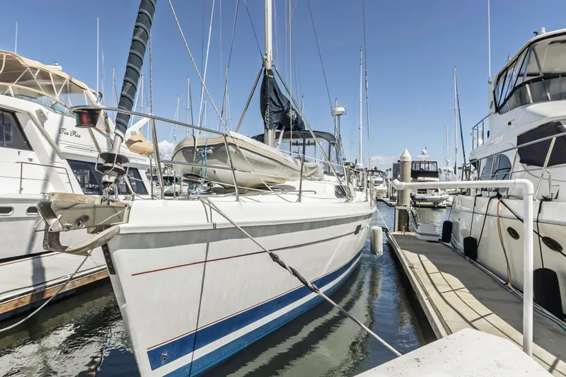 Romanc'n The Zea Yacht Photos Pics Sailboat docked at marina, Hunter 456 model, 1997, surrounded by other boats.