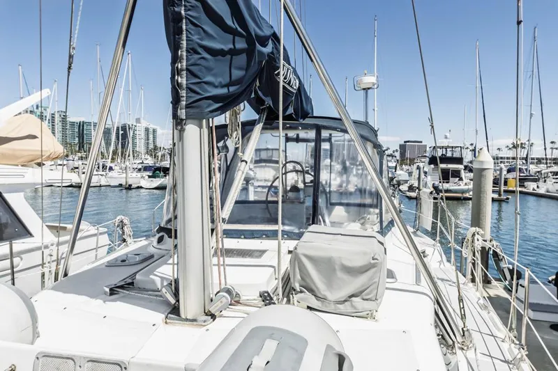 Romanc'n The Zea Yacht Photos Pics Sailboat docked in marina, Hunter 456 model, 1997, with clear blue sky.