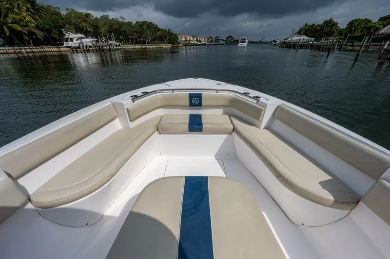  Yacht Photos Pics 2015 Belzona 32C boat with spacious seating on a calm waterway.