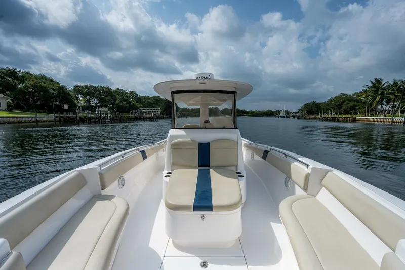  Yacht Photos Pics 2015 Belzona 32C boat with spacious seating on a calm waterway.